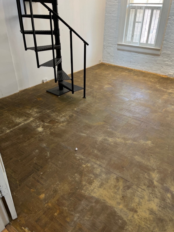 Daum residence hardwood floor before refinishing