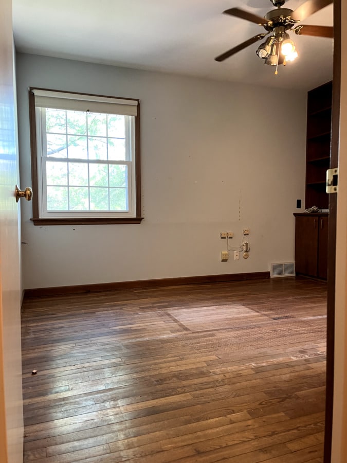 Thomas residence hardwood floor before refinishing